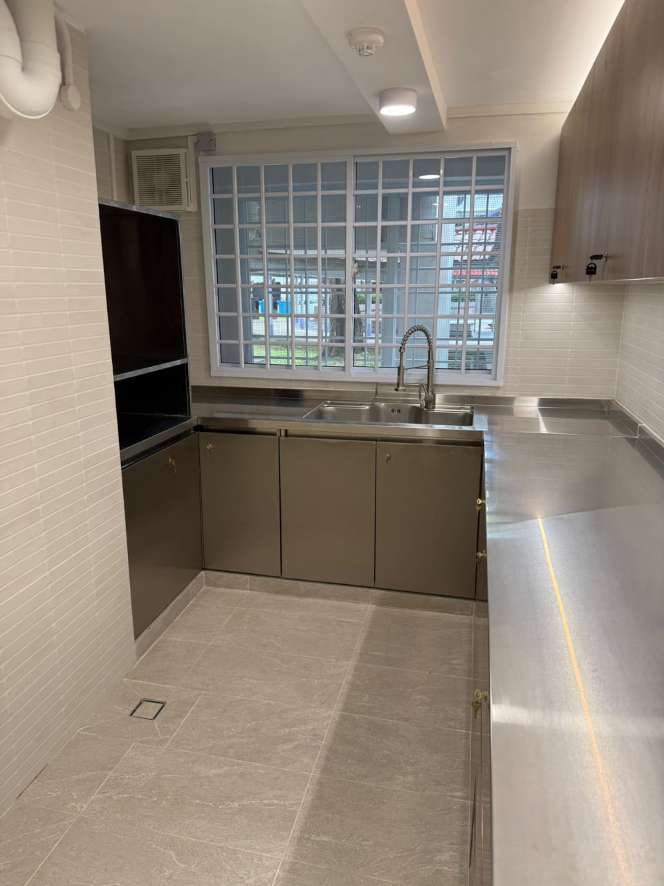 Customised Stainless Steel Kitchen Cabinet with Lock handleless at customer house - Customised Stainless Steel Kitchen Cabinet with Lock handleless at customer house