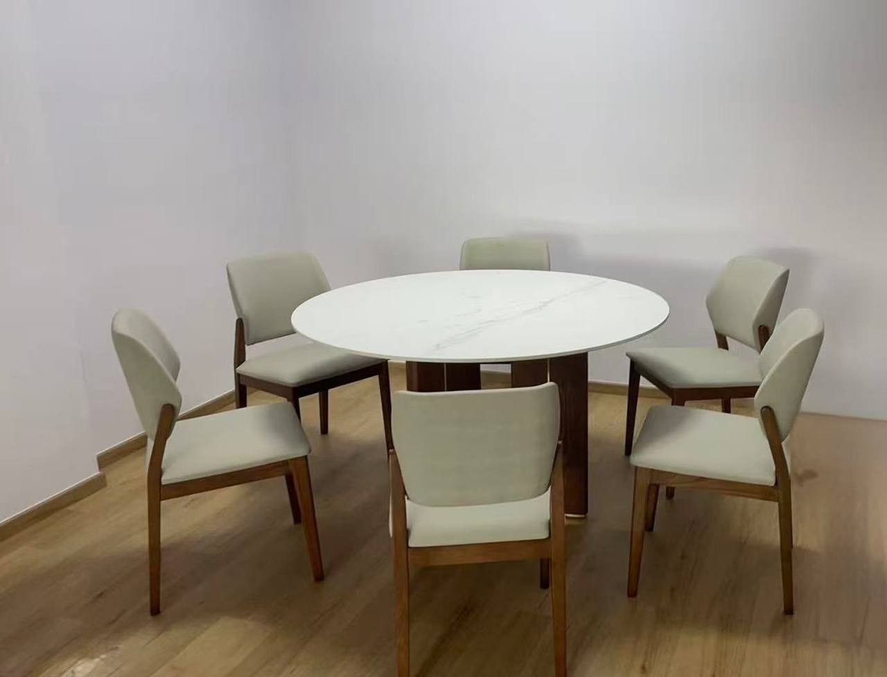 Dulce Sintered Stone Ash Wood Round Dining Table at customer house in Singapore