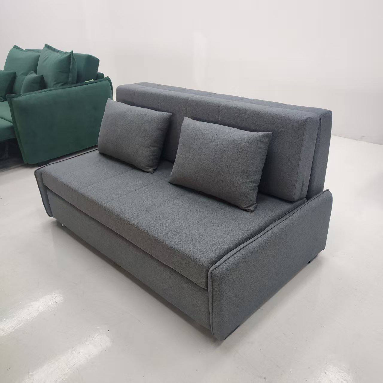 Ava Sofa Bed with Storage grey side view at factory Ava Sofa Bed with Storage grey side view at factory