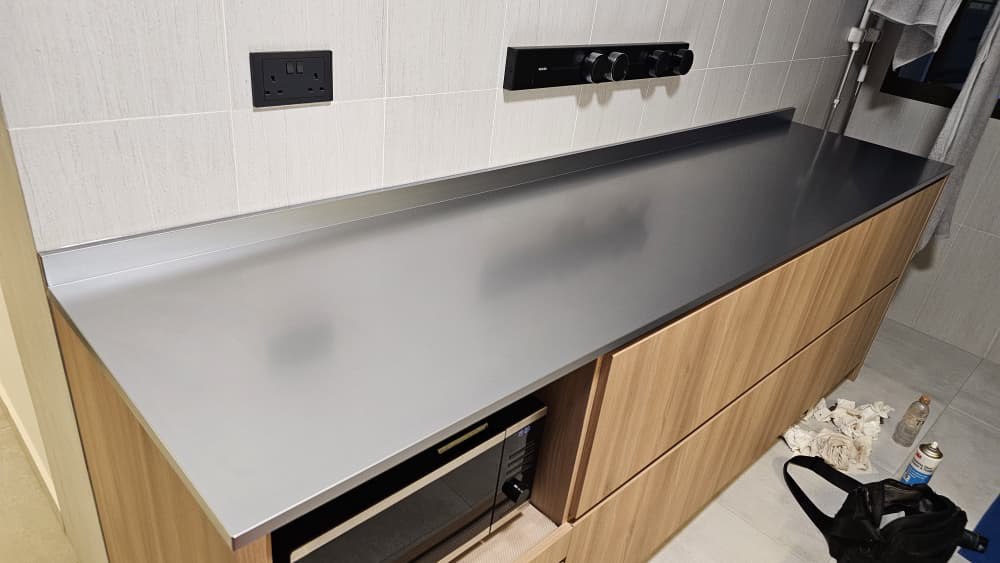 close up of wood look japandi look premium stainless steel cabinet at customer house - close up of wood look japandi look premium stainless steel cabinet at customer house