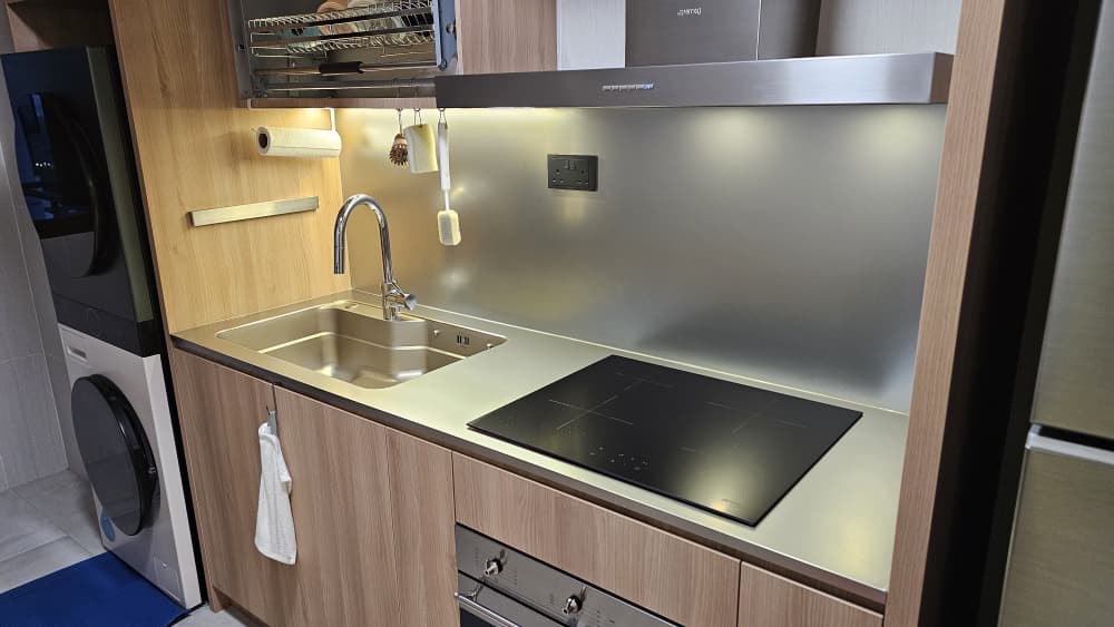 close up of wood look japandi look premium stainless steel cabinet at customer house close up of wood look japandi look premium stainless steel cabinet at customer house