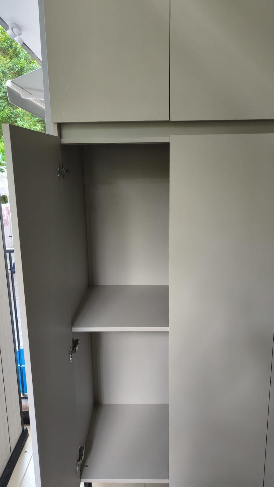 Customised Aluminium Outdoor Tall Cabinet installed delivered at customer home - internal view- Customised Aluminium Outdoor Tall Cabinet installed delivered at customer home - internal view